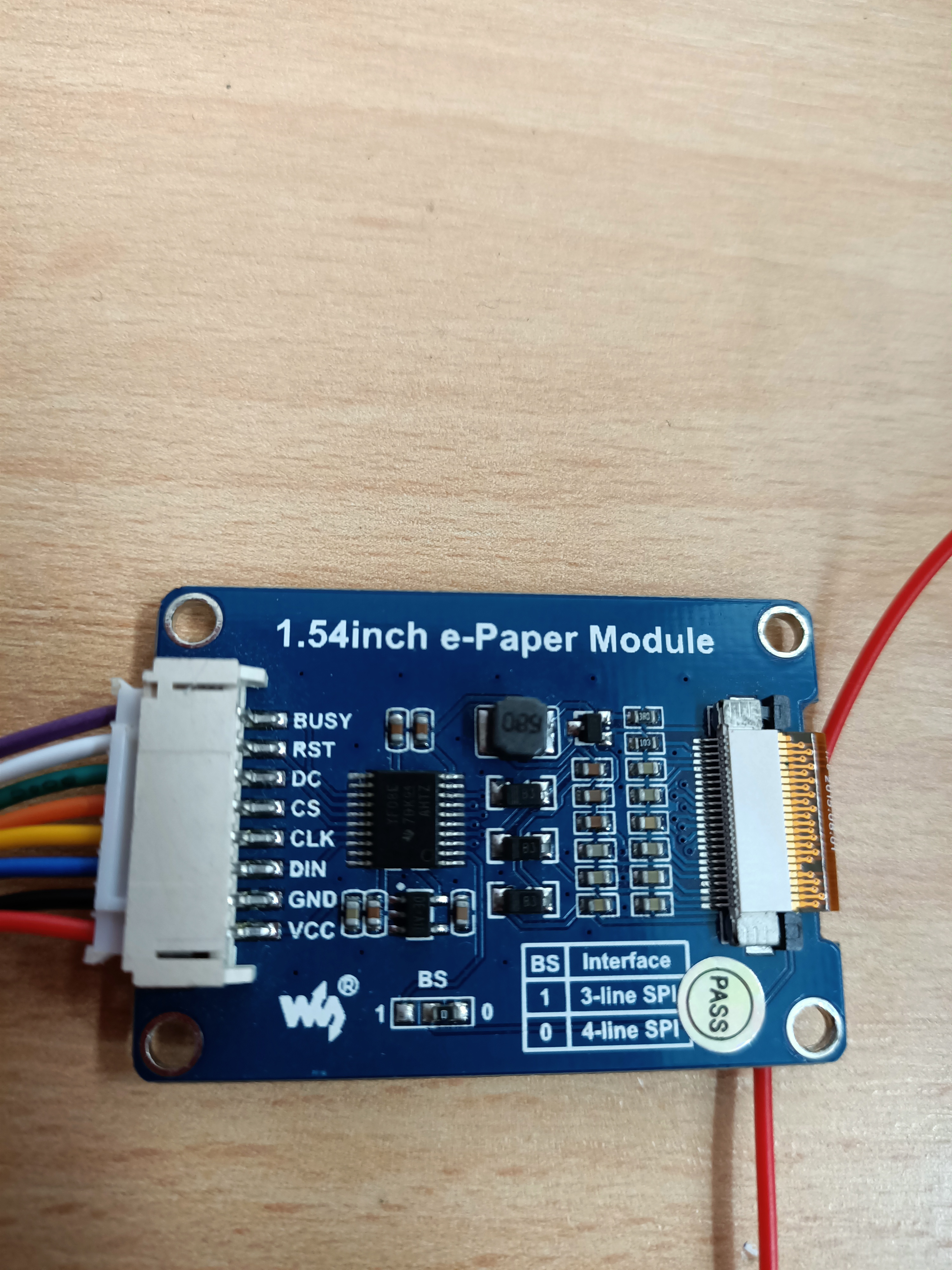 Waveshare 1.54-inch e-paper module with its eight labelled SPI pins